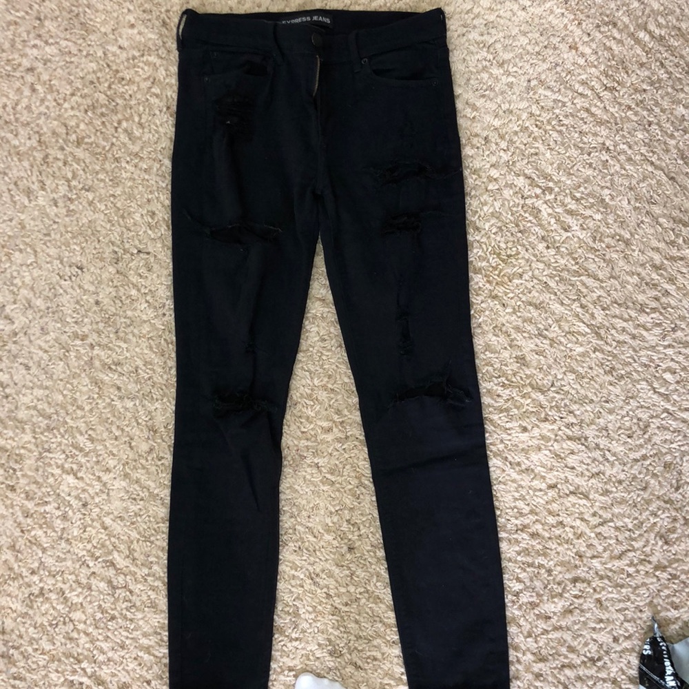 Black distressed skinny jeans